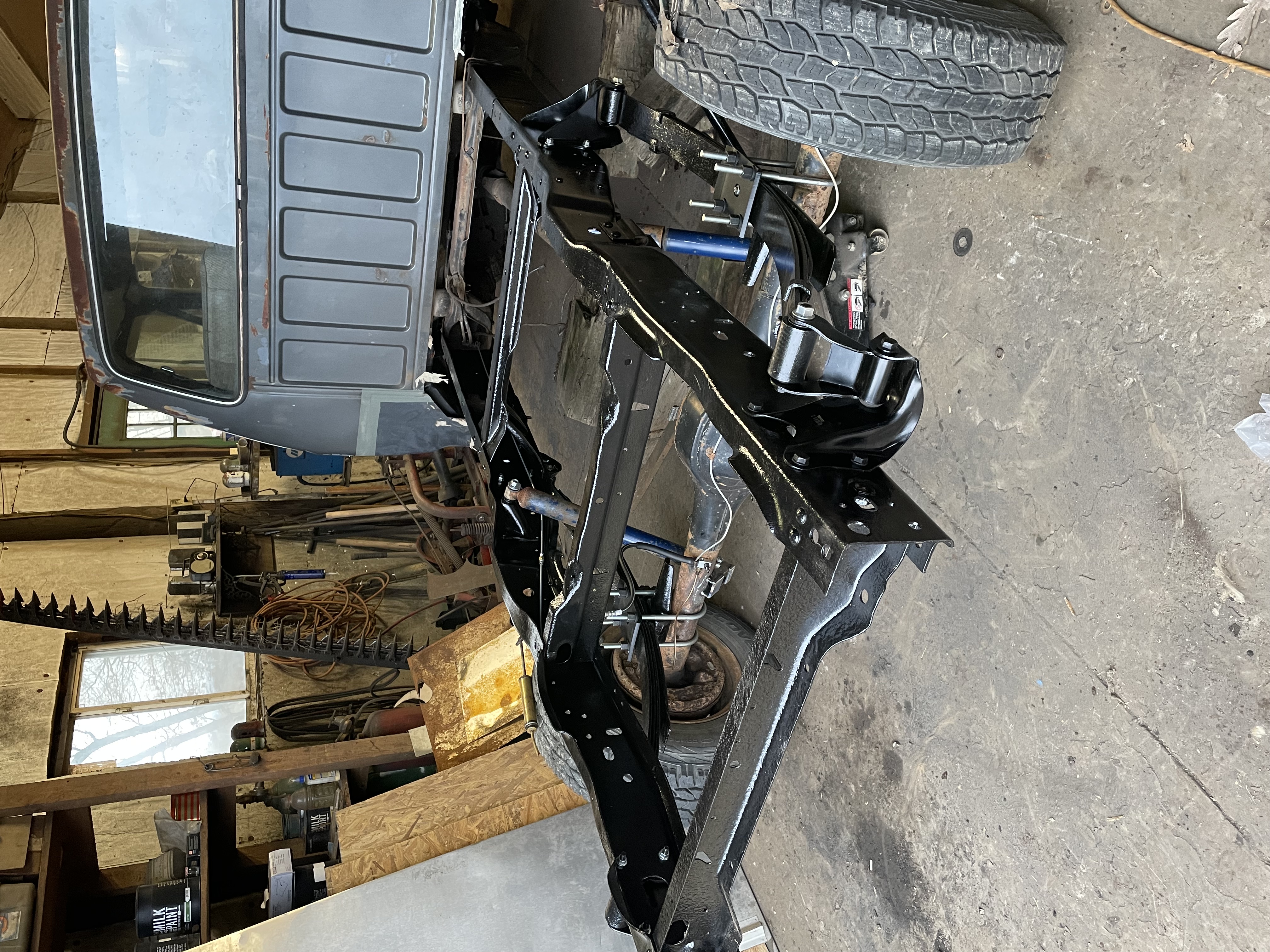I then painted the frame and reinstalled the rear axle with new leaf spring bushings, shackles, and hangers