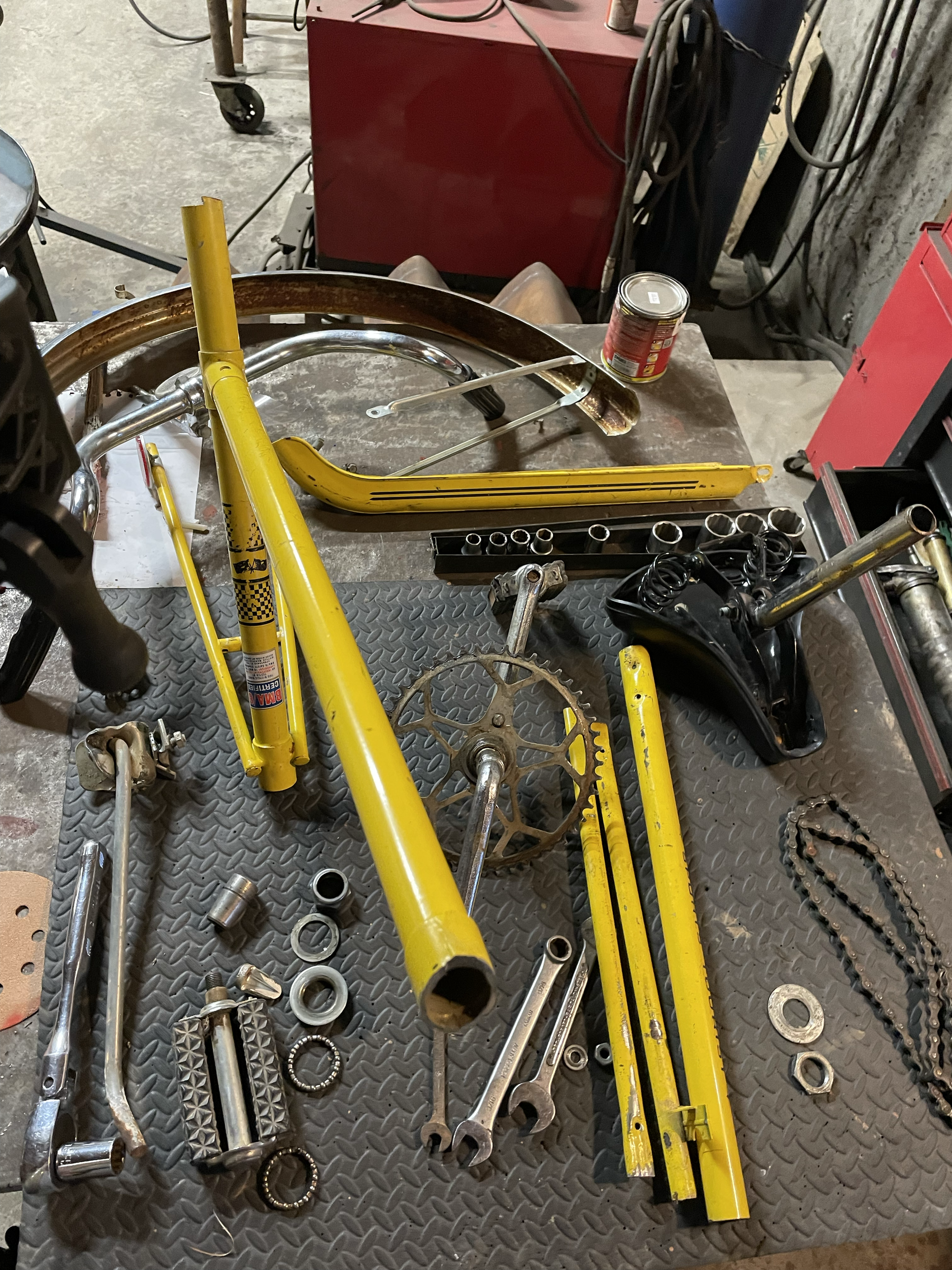 I started by cutting apart an old bike laying in our shed. I stripped all the useable components.