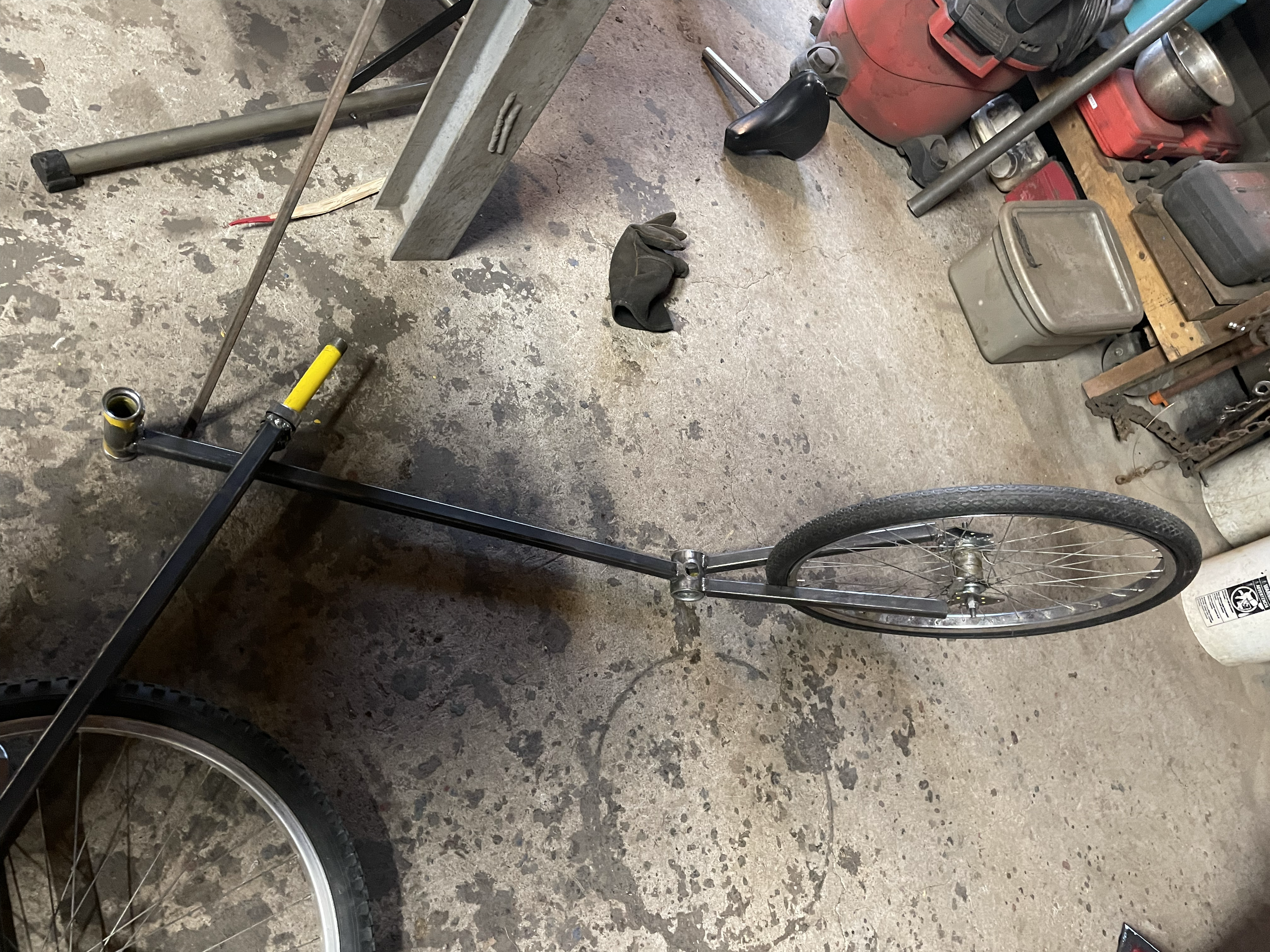 Using the bottom bracket, dropouts, and old headtube, I started fabricating a new frame