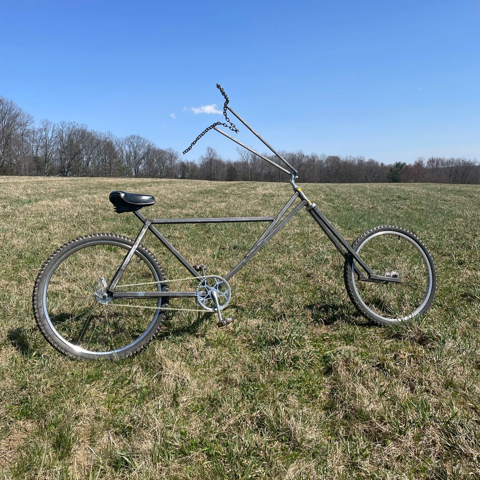 For handlebars, I welded a chain solid